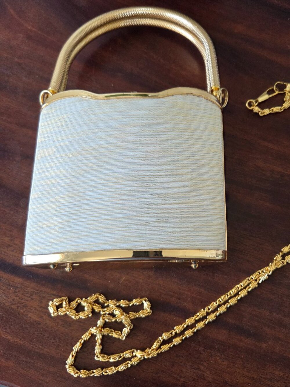 Evening/cocktail purse Gold tone hardware and brushed beige gold design